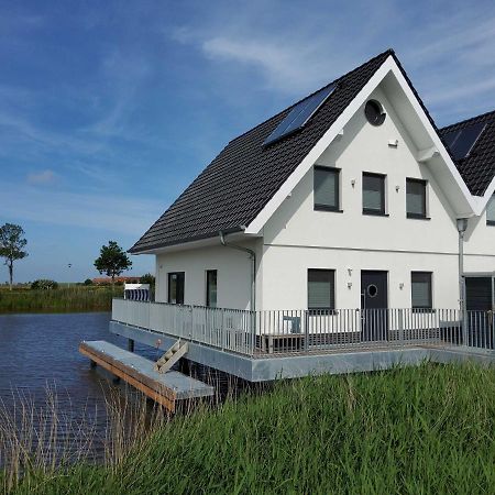 Nr 110 - Ferienhaus Seeperle Pfahlhaus Auf Der Harle 카롤리넨시엘 외부 사진
